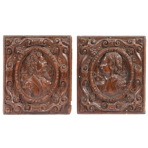 77 - A PAIR OF LATE 16TH CENTURY CARVED OAK PORTRAIT PANELS, FLEMISH, CIRCA 1570. A male portrait, facing... 