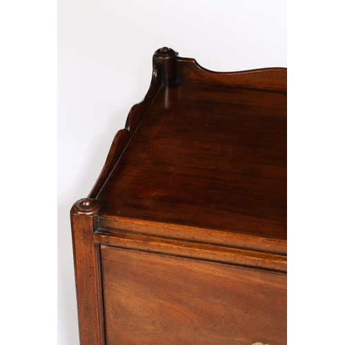 2 - A GEORGE III MAHOGANY TRAY TOP BEDSIDE COMMODE. having a wavy gallery above a sliding drawer raised ... 