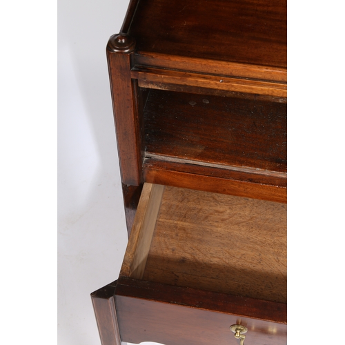 2 - A GEORGE III MAHOGANY TRAY TOP BEDSIDE COMMODE. having a wavy gallery above a sliding drawer raised ... 