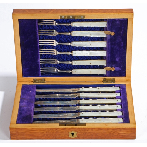 242 - AN EDWARDIAN CASED SET OF SILVER AND MOTHER OF PEARL KNIVES AND FORKS. William Batt & Sons, Sheffiel... 