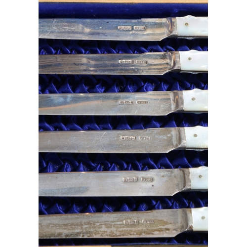 242 - AN EDWARDIAN CASED SET OF SILVER AND MOTHER OF PEARL KNIVES AND FORKS. William Batt & Sons, Sheffiel... 