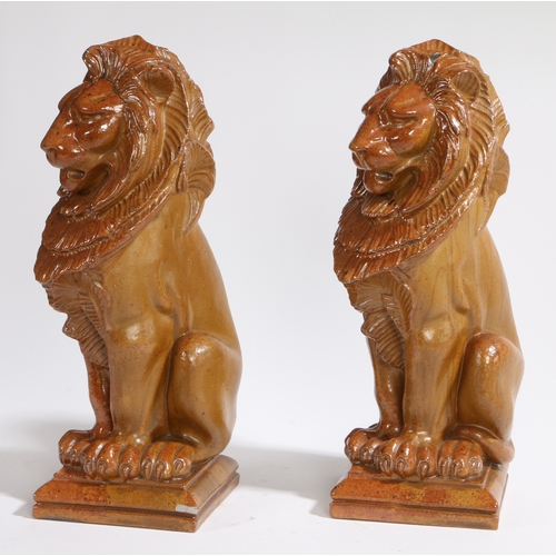 250 - ALFRED G HOPKINS (1884-1940), A PAIR OF SALT GLAZED STONEWARE LIONS. both stamped A G Hopkins - Lamb... 