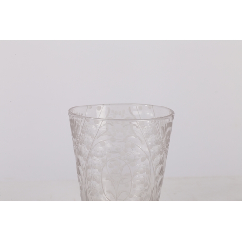 263 - A MID 18TH CENTURY BOHEMIAN ENGRAVED BEAKER. Circa 1740, engraved with floral patterns, 12cm high.