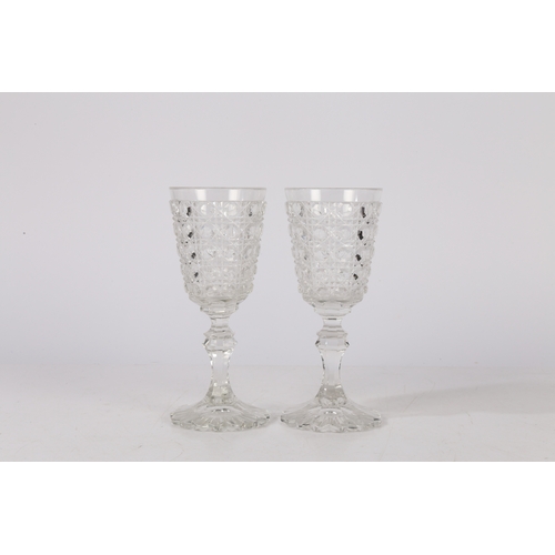 264 - A PAIR OF MID 19TH CENTURY RUSSIAN CUT GLASS GOBLETS. Circa 1840-50, having a flat cut bowl and a kn... 