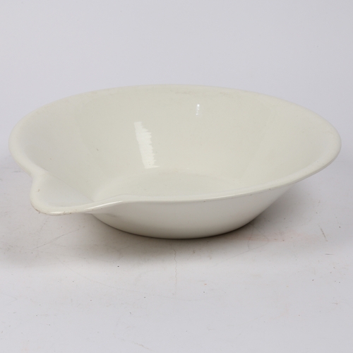 283 - A LARGE EARLY 20TH CENTURY DAIRY CREAM PAN. The large ironstone cream pan with pouring lip, marked t... 