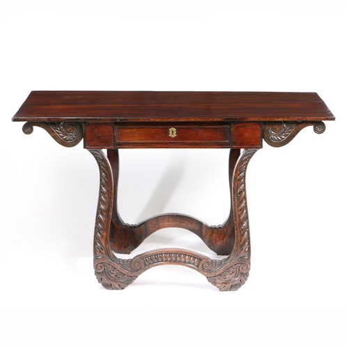 37 - AN ITALIAN ROSEWOOD AND FAUX ROSEWOOD TABLE. having a rectangular top above a single drawer raised o... 