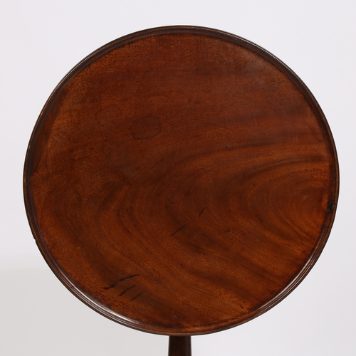 38 - A GEORGE III MAHOGANY DISH TOP OCCASIONAL TABLE. having a circular dish top above a baluster column ... 