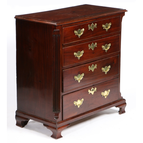 40 - A GEORGE III MAHOGANY CHEST OF DRAWERS OF SMALL PROPORTIONS. having a rectangular top raised on four... 