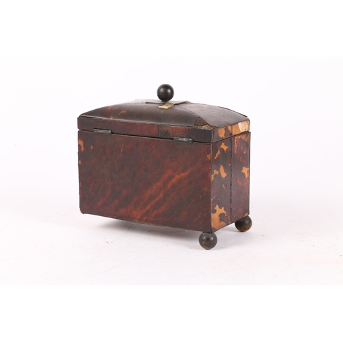 48 - A 19TH CENTURY TORTOISESHELL AND BRASS TEA CADDY. of bow fronted form, and having a ball finial to t... 