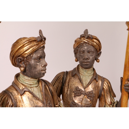 66 - A PAIR OF 20TH CENTURY BLACKAMOOR FLOOR LAMPS. resin figures mounted on plinth bases holding a lante... 