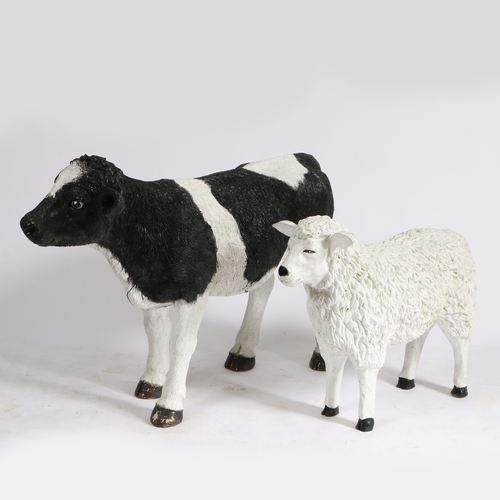 80 - A LIFE SIZE RESIN CALF GARDEN ORNAMENT TOGETHER WITH A LAMB. the calf 105cm long 76cm high.