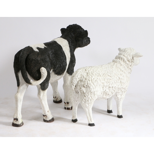 80 - A LIFE SIZE RESIN CALF GARDEN ORNAMENT TOGETHER WITH A LAMB. the calf 105cm long 76cm high.