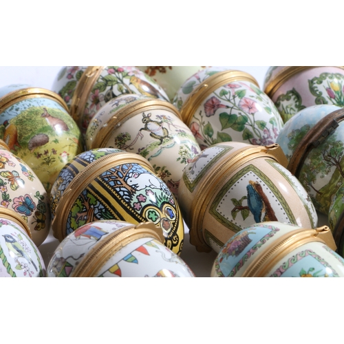 82 - NINETEEN HALCYON DAYS BILSTON & BATTERSEA ENAMEL EASTER EGG BOXES. Various dates, no certificates (1... 