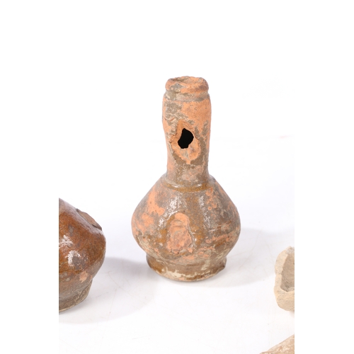 13 - A BYZANTINE POTTYER OIL LAMP, CIRCA 6TH - 8TH CENTURY AD. Together with a Holy Land oil lamp and two... 