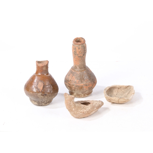 13 - A BYZANTINE POTTYER OIL LAMP, CIRCA 6TH - 8TH CENTURY AD. Together with a Holy Land oil lamp and two... 