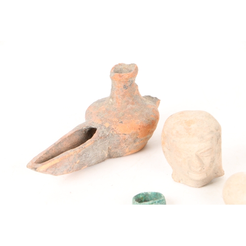 26 - A COLLECTION OF ARTIFACTS (7). to include Syrian oil lamps 10th/11th century AD, a Pre Colombian pot... 