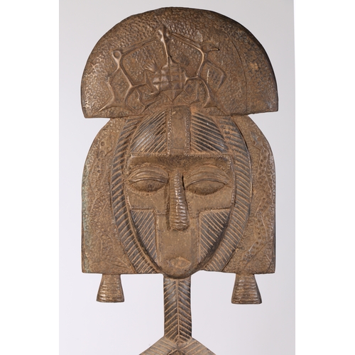 43 - A KOTA RELIQUARY FIGURE MASK, GABON. second third of the 20th century, having a wooden and copper/ti... 