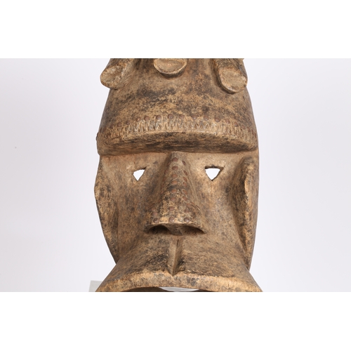 48 - A EXTREMELY LARGE DAN KRAN MASK, LIBERIA. second third of the 20th century, having a carved wood and... 