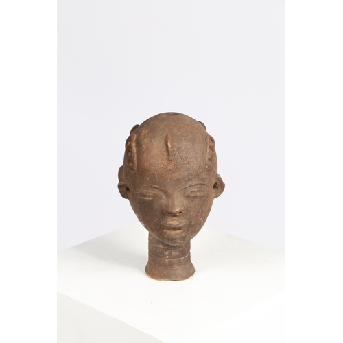 51 - AN AKAN NSODI CLAY POTTERY DOUBLE SIDED HEAD, GHANA. each face having ring decoration to the forehea... 