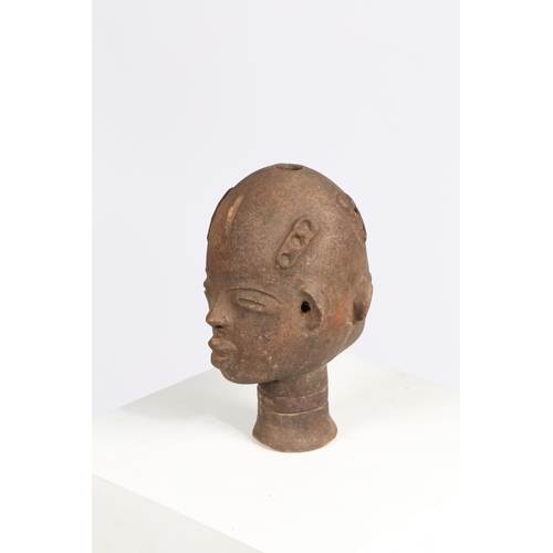 51 - AN AKAN NSODI CLAY POTTERY DOUBLE SIDED HEAD, GHANA. each face having ring decoration to the forehea... 