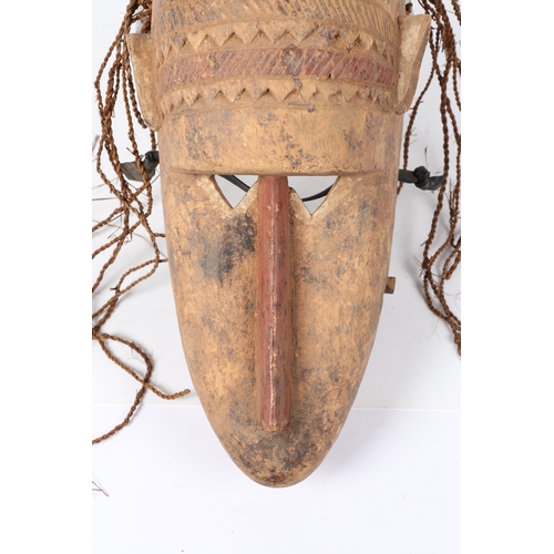 58 - A KRAN HYENA MASK, LIBERIA. second half of the 20th century, having a pronounced forehead having ban... 