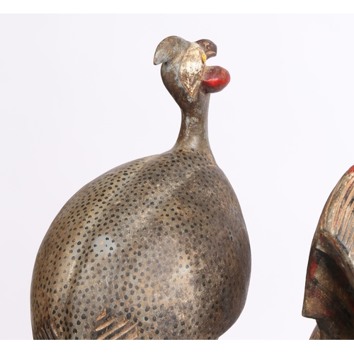 59 - TWO AFRICAN CARVED BIRDS. mid 20th century, to include a carved Cockerel probably Cameroon and a Cra... 