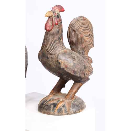 59 - TWO AFRICAN CARVED BIRDS. mid 20th century, to include a carved Cockerel probably Cameroon and a Cra... 