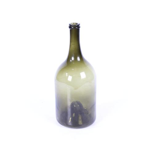 101 - A LARGE 18TH CENTURY GREEN MALLET BOTTLE. having a slender neck above a mallet body, 35cm high.