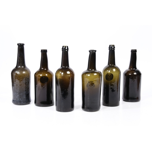 102 - SIX 18TH CENTURY GLASS SEAL BOTTLES BEARING THE SAME SEALS. all bearing the seal 