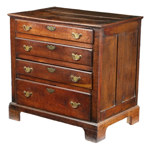 12 - A GEORGE III OAK CHEST OF DRAWERS, CIRCA 1800. The rectangular top above four long graduated drawers... 