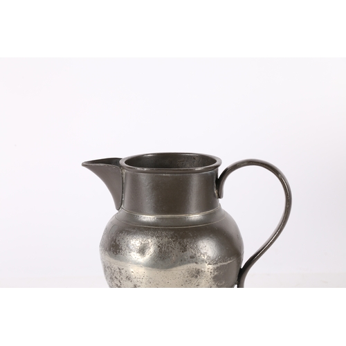 123 - A GEORGE III PEWTER QUART ALE JUG, CIRCA 1800. The body of ovoid form, with tall cylindrical collar ... 