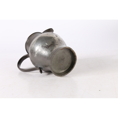 123 - A GEORGE III PEWTER QUART ALE JUG, CIRCA 1800. The body of ovoid form, with tall cylindrical collar ... 