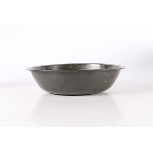 124 - A PEWTER NARROW RIM DEEP BOWL OR BASIN, PROBABLY GLASGOW. With steep booge and flat base, diameter 2... 