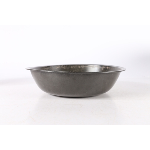 124 - A PEWTER NARROW RIM DEEP BOWL OR BASIN, PROBABLY GLASGOW. With steep booge and flat base, diameter 2... 