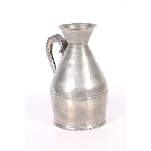 128 - AN UNCOMMON PEWTER HALF-GALLON HAYSTACK MEASURE, IRISH, CIRCA 1830. The slender body of typical form... 