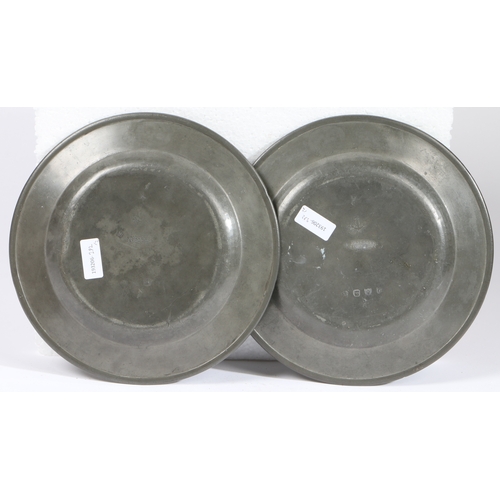 144 - A PAIR OF GEORGE II PEWTER PLAIN RIM PLATES, CIRCA 1730-50. Each with ownership medallion Borough o... 