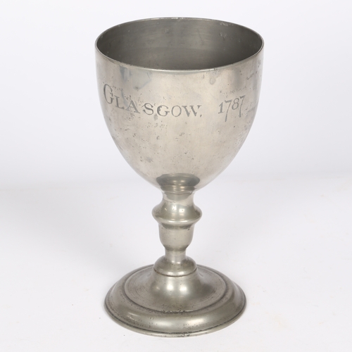 148 - A GEORGE III PEWTER CHALICE, SCOTTISH, DATED 1787. The large bowl engraved BAPTIST CHURCH GLASGOW 1... 