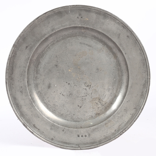 151 - A CHARLES II PEWTER CHARGER, CIRCA 1685. Hallmarks to the rim and touchmarks to the rear of Edward K... 