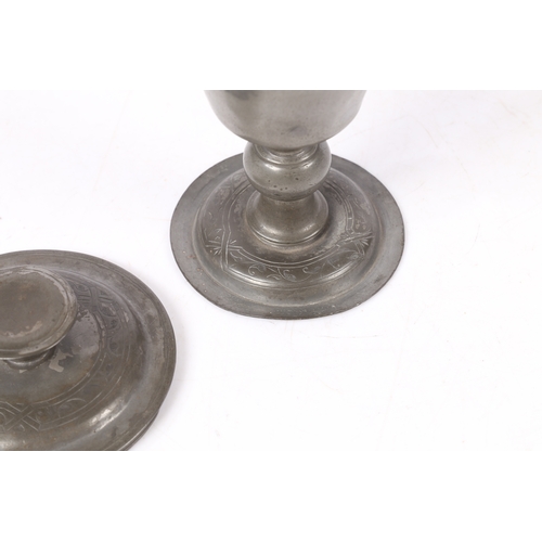 157 - A 17TH CENTURY PEWTER COMMUNION CUP AND COVER, DATED 1650. having a bucket shape body above a ball k... 