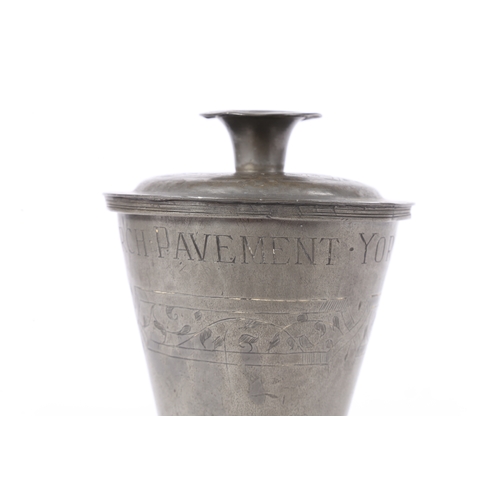 157 - A 17TH CENTURY PEWTER COMMUNION CUP AND COVER, DATED 1650. having a bucket shape body above a ball k... 