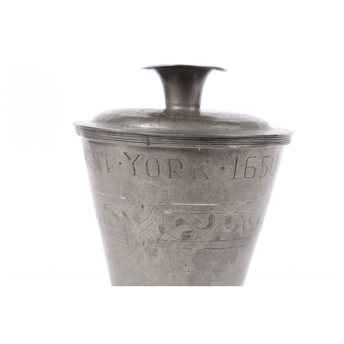 157 - A 17TH CENTURY PEWTER COMMUNION CUP AND COVER, DATED 1650. having a bucket shape body above a ball k... 