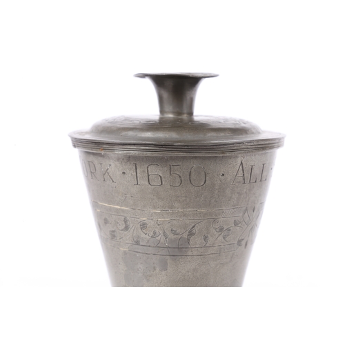 157 - A 17TH CENTURY PEWTER COMMUNION CUP AND COVER, DATED 1650. having a bucket shape body above a ball k... 