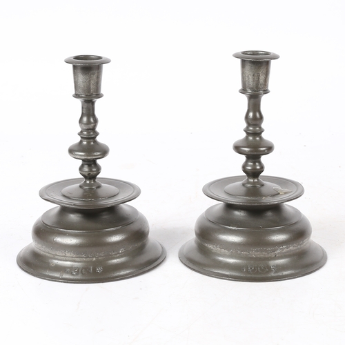 158 - A PAIR OF PEWTER LOW BELL CANDLESTICKS, IN THE 17TH CENTURY BRASS NUREMBERG MANNER. Each baluster ... 