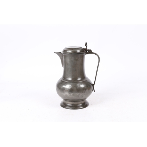 159 - A PEWTER SPOUTED DOMED-LIDDED BULBOUS FLAGON, POSSIBLY ENGLISH, CIRCA 1700. Having a pear-shaped bod... 