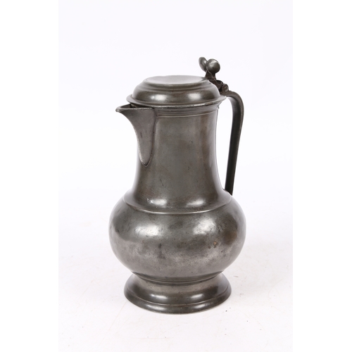 159 - A PEWTER SPOUTED DOMED-LIDDED BULBOUS FLAGON, POSSIBLY ENGLISH, CIRCA 1700. Having a pear-shaped bod... 