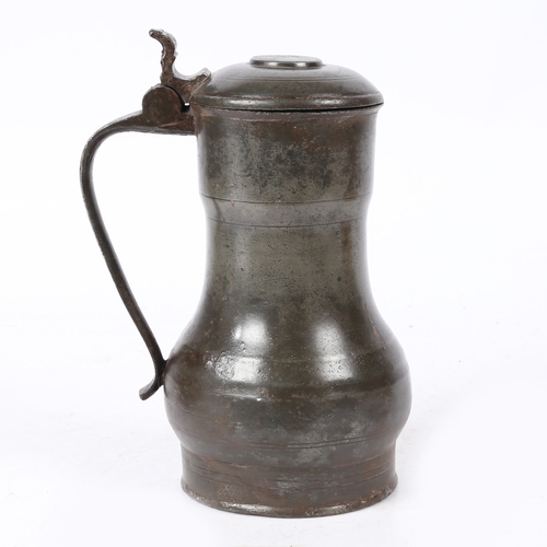 160 - A REMBRANDT' PEWTER FLAGON, DUTCH, CIRCA 1700. The top of the domed-lid with a crowned rose makers... 