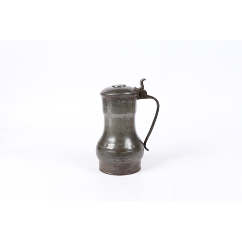 160 - A REMBRANDT' PEWTER FLAGON, DUTCH, CIRCA 1700. The top of the domed-lid with a crowned rose makers... 