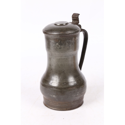 160 - A REMBRANDT' PEWTER FLAGON, DUTCH, CIRCA 1700. The top of the domed-lid with a crowned rose makers... 