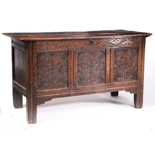 165 - A CHARLES II OAK COFFER, WEST COUNTRY. CIRCA 1670. Having a twin boarded top, the front of three pan... 