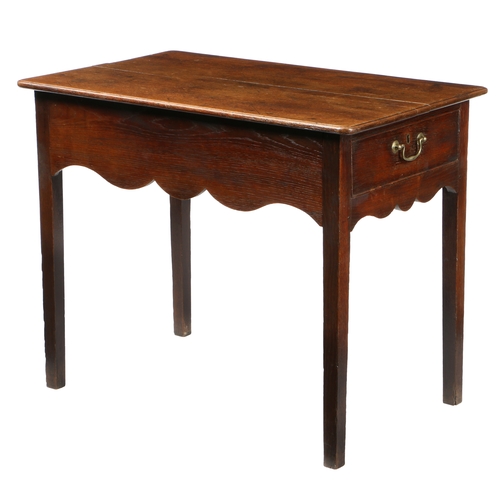 166 - AN UNUSUAL OAK SIDE TABLE, WELSH. the rectangular top above a single drawer with brass swan neck han... 